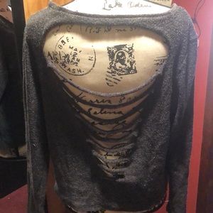 Pull over sweater with open back